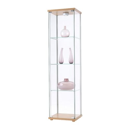 IKEA DETOLF glass cabinet with generic trinkets on the shelves